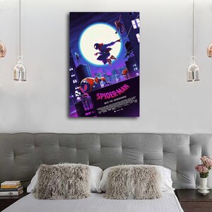May include: A framed poster featuring the movie "Spider-Man: Into the Spider-Verse." The artwork depicts Spider-Man in action, silhouetted against a large moon and city skyline. The color palette includes shades of purple, blue, and red.
