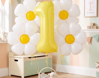 Ramo de globos con forma de margarita y número, artículos para fiestas estilo boho en tonos pastel.