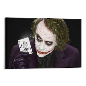 May include: A canvas print featuring a character with white face paint, smeared red lipstick, and messy green hair. The character wears a purple jacket and holds a white playing card with a jester illustration and the text JOKER.