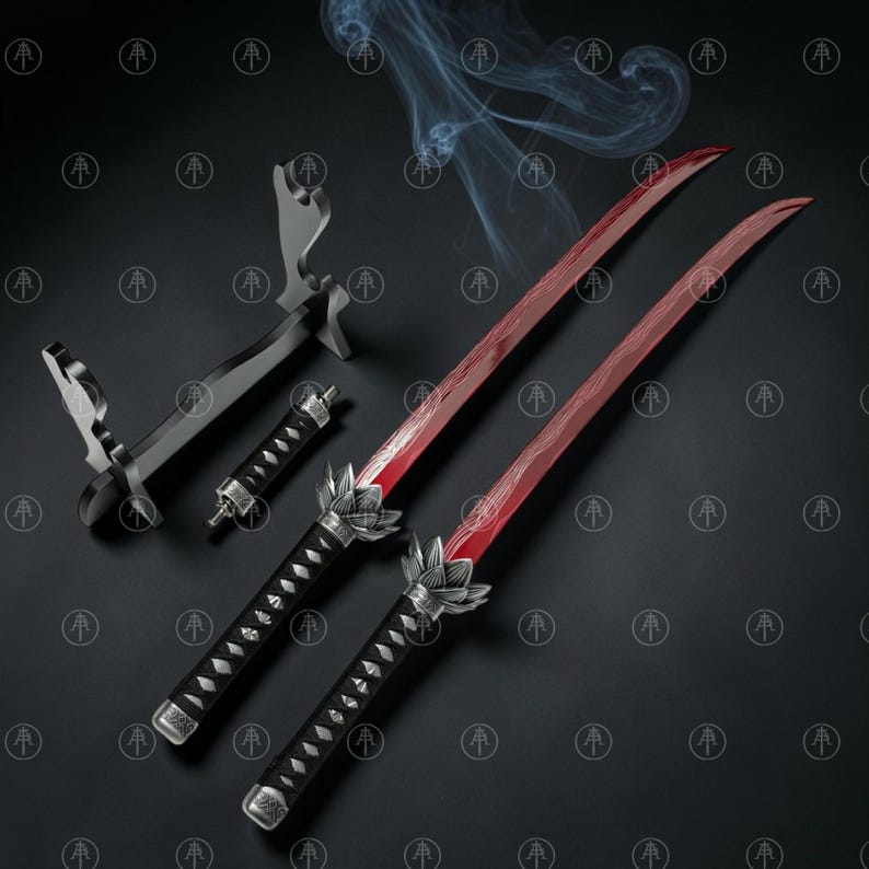 May include: Two swords with vibrant red blades and black handles featuring silver lotus-shaped guards. The set includes a black display stand and a small black handle component. The blades have a wavy pattern and are surrounded by wisps of smoke.