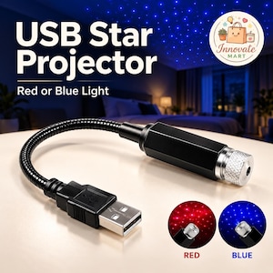 May include: A black USB star projector with a flexible neck and a silver textured lens cap. The device features a standard USB connector and displays red or blue light patterns as shown in the two circular insets labeled RED and BLUE.