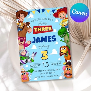 May include: A light blue birthday invitation card featuring Toy Story characters including Woody, Jessie, Buzz Lightyear, Rex, Bullseye, Lotso, and Mr. and Mrs. Potato Head. The text reads: You've got a friend who's turning three, James, August 15, 4:00 PM.