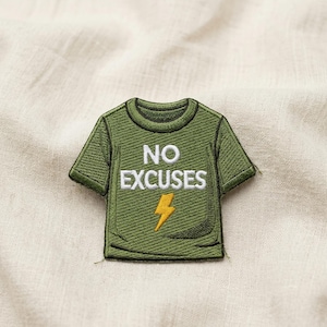 May include: Embroidered patch in the shape of a green t-shirt with the words "NO EXCUSES" in white and a yellow lightning bolt. The patch is on a beige fabric background.
