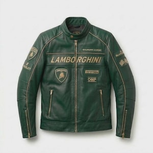 May include: Green leather jacket with gold accents and multiple patches. The jacket features the Lamborghini logo and other brand patches. It has a zip-up front, zippered pockets, and a stand-up collar. The jacket is a stylish piece of outerwear.