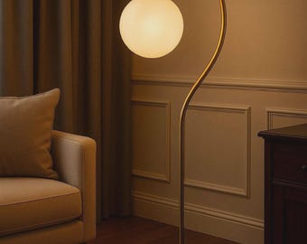 brass floor lamp with curved arm and opal glass globe shade bast gift.