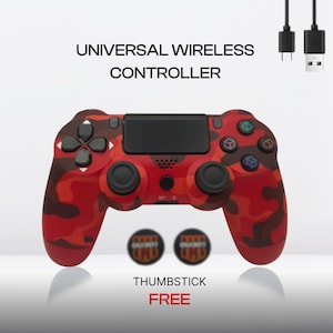 May include: Red and brown camouflage-patterned universal wireless controller with black buttons and a black touchpad. The image includes the text "UNIVERSAL WIRELESS CONTROLLER" and "THUMBSTICK FREE". Two thumbsticks are also included.