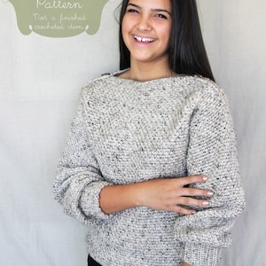 May include: A crochet sweater pattern in PDF format. The pattern is for a light grey sweater with a speckled texture. The text "PDF Crochet Pattern" and "Not a finished crocheted item." is displayed on the image.