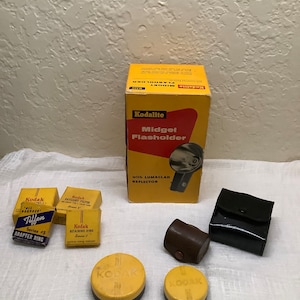 Lot of Vintage Kodak Camera Lens~ Filters~Leather Cases~Adapters~Flasholder.