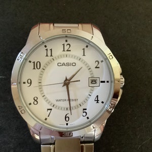 Relógio masculino Casio 5058 #MTP-V004 com caixa e pulseira de aço inoxidável ~ Bateria nova
