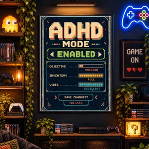 May include: A rectangular wall poster with a dark background featuring pixel art text that reads ADHD MODE ENABLED. The design includes status bars for OBJECTIVE UNCLEAR, INVENTORY FULL, and VIBES EXCELLENT, with a button at the bottom stating SAVE CHANGES? TOO LATE.