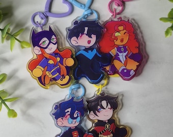 Portachiavi DC Comics con mano che tiene Starfire Nightwing Batgirl Superboy Red Robin