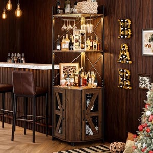 May include: A corner bar cabinet featuring a dark wood finish and a black metal frame. The unit includes open shelving for bottles and glassware, a built-in stemware rack, and a lower cabinet with two doors featuring X-shaped metal mesh panels.