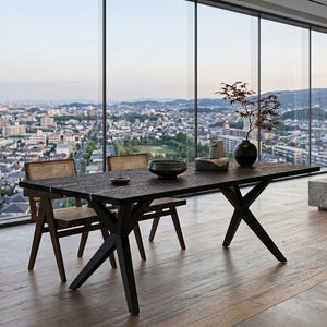 May include: A dark wood dining table with a textured surface and X-shaped legs. Two chairs with woven backs are positioned on either side. A black vase with a plant and a ceramic bowl are on the table. The table is 254 cm long.
