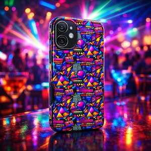 May include: A colorful phone case with a vibrant, geometric pattern of triangles, lightning bolts, and cassette tapes in shades of blue, pink, yellow, and purple. The case has a dual-lens camera and a black frame.