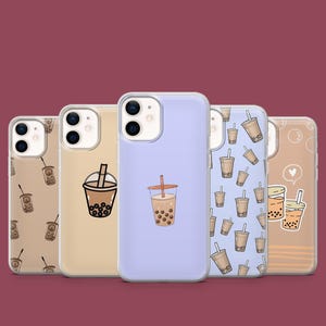 May include: A collection of phone cases featuring bubble tea designs. The cases showcase various illustrations of bubble tea cups with straws and tapioca pearls, set against different background colors, including tan, blue, and brown.