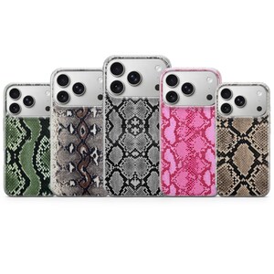 May include: Five phone cases with a snake skin pattern in various colors: green, brown, gray, pink, and tan. The cases have a clear top section with camera lenses.