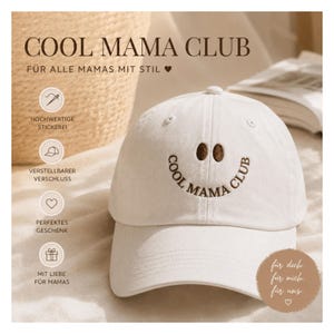 Könnte beinhalten: Eine cremeweiße Baseballkappe mit brauner Stickerei auf der Vorderseite. Das Design zeigt zwei ovale Formen als Augen und den Schriftzug COOL MAMA CLUB in einer Kurve darunter. Die Kappe hat eine strukturierte Krone und einen gebogenen Schirm.