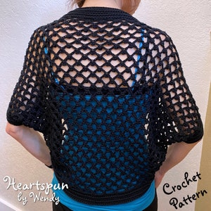 May include: Black crochet top with a heart-shaped stitch pattern. The top is sleeveless and has a loose fit. The text "Heartspun by Wendy" and "Crochet Pattern" is visible in the image.
