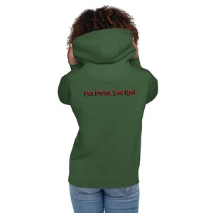 Unisex HoodieNot Perfect, Just Real tee — raw, unapologetic, and fearless. Wear your truth, no filter, no excuses