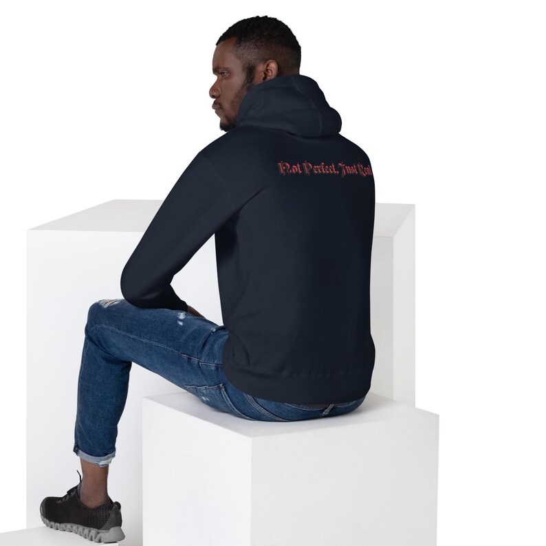 Unisex HoodieNot Perfect, Just Real tee — raw, unapologetic, and fearless. Wear your truth, no filter, no excuses