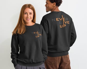 "Saubere ""Never Give Up"" Typografie in gelb und schwarz, eine zeitlose Botschaft von Motivation, Fokus und innerer Stärke."