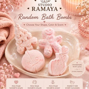 Puede incluir: Cuatro bombas de baño de color rosa claro con formas de árbol de Navidad, hombre de jengibre, cara de personaje circular y una mano haciendo un gesto de corazón. El texto dice Studio Ramaya Random Bath Bombs, Choose Your Shape, Color & Scent.