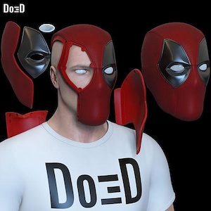 May include: A disassembled red and black Deadpool mask with a white t-shirt that has the text "Do=D". The mask is shown in several pieces, including the main face covering, eye pieces, and side components. The mask has a sleek, modern design.