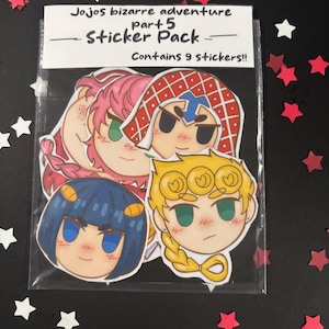 May include: A clear plastic pack containing nine stickers featuring anime character illustrations. The pack is labeled "Jojos bizarre adventure part 5 Sticker Pack" with the text "Contains 9 stickers!!" on a white label. The background is black with scattered red and white star-shaped confetti.