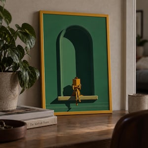 Peut inclure: Une impression d'art encadrée sur fond vert profond avec un élément architectural en arche au centre. Une petite silhouette est assise sur un rebord à l'intérieur de l'arche, tenant un livre jaune ouvert. Le cadre est de couleur jaune moutarde.