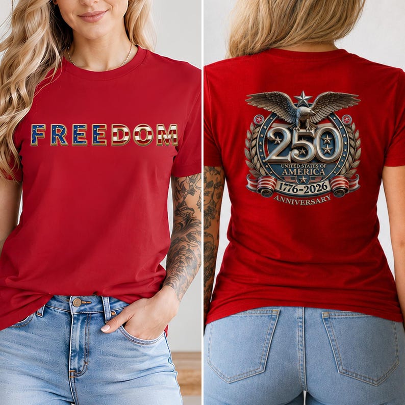 May include: A red t-shirt featuring the word FREEDOM on the front in a patriotic flag pattern. The back displays a graphic with a bald eagle, the number 250, the text UNITED STATES OF AMERICA, 1776-2026, and ANNIVERSARY in a circular emblem.