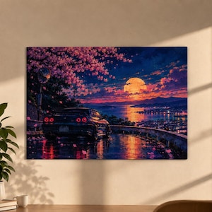 Könnte beinhalten: Ein rechteckiger Wandkunstdruck, der einen dunklen Sportwagen zeigt, der nachts auf einer nassen Straße geparkt ist. Ein großer Vollmond leuchtet über einer Küstenstadt und dem Wasser. Rosa Kirschblütenzweige hängen darüber und Blütenblätter.