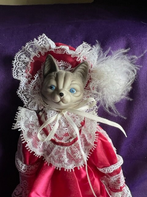 Porcelain cat doll sales