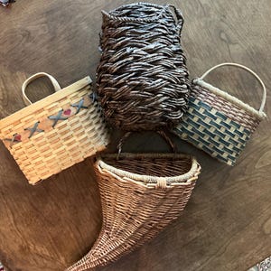 Vintage hanging threshold baskets. Flower baskets