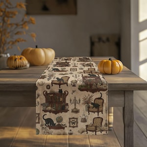 May include: A beige table runner featuring a repeating pattern of black cats, vintage armchairs, bookshelves, open books, candelabras, globes, skulls, and botanical elements. The design includes various potion bottles and framed butterfly illustrations.