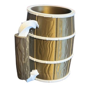 May include: A decorative water fountain with a barrel design. The fountain is gold with white trim and a faux wood grain texture. A small log-shaped element is attached to the side, with water flowing from it.