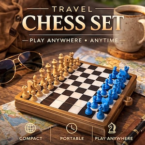 May include: A travel chess set with the text "TRAVEL CHESS SET - PLAY ANYWHERE • ANYTIME". The set features a wooden board with black and white squares, and beige and blue chess pieces. The set is labeled "COMPACT", "PORTABLE", and "PLAY ANYWHERE".
