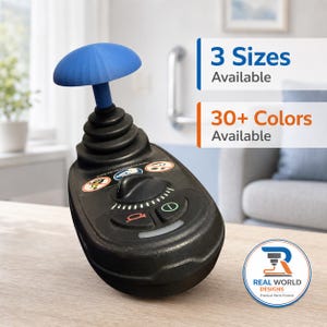May include: A black joystick controller with a blue mushroom-shaped top, featuring a horn icon, a power button, and warning labels. Text on the image reads 3 Sizes Available and 30+ Colors Available, with a Real World Designs logo in the corner.