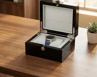 Caja de lujo con tapa abatible para relojes de hombre: elegante y resistente al agua.