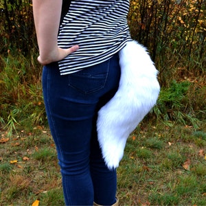 Weißer Wolf Schwanz