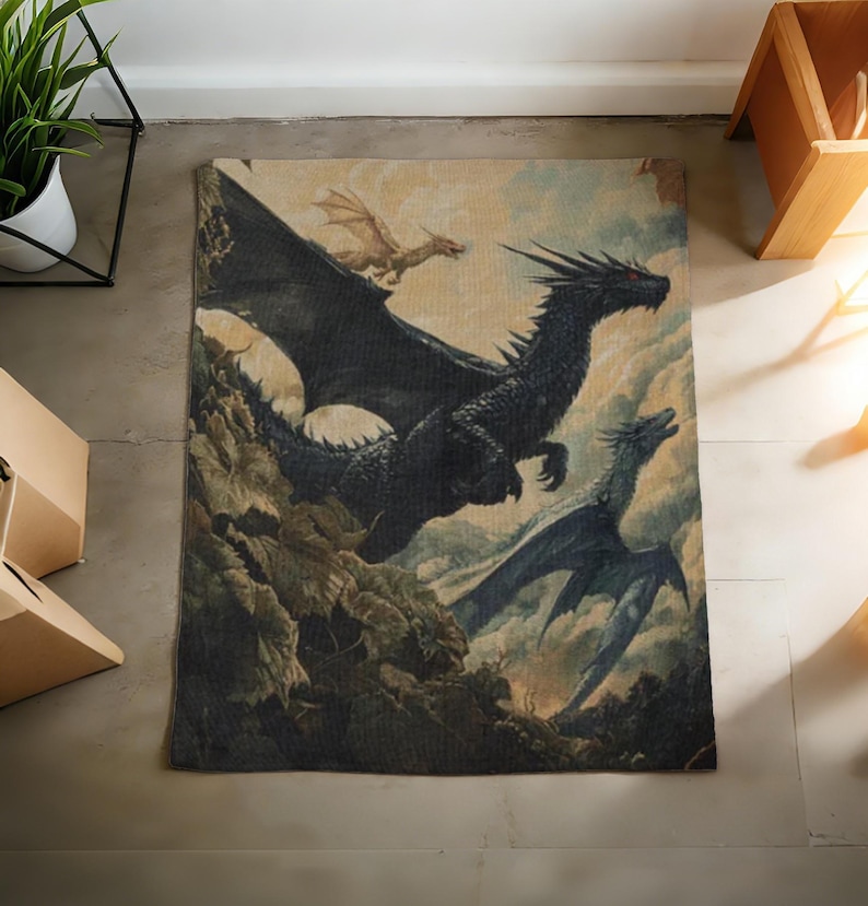 May include: A rectangular rug depicting a fantasy scene with three dragons in flight against a cloudy sky. The central dragon is black, with others in blue and gold. The artwork has a vintage, painterly style.