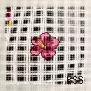 May include: A needlepoint canvas featuring a pink hibiscus flower with a yellow center. The flower is centered on a white grid background. A color palette of pink, yellow, and brown is on the left. The letters "BSS" are in the bottom right corner.