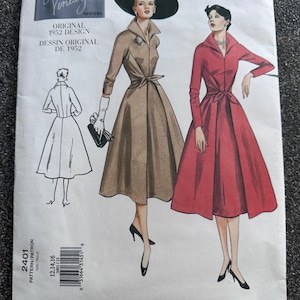 May include: Vogue Vintage Model sewing pattern featuring an original 1952 design. The cover shows illustrations of two women in dresses, one in brown and the other in red. The pattern includes sizes 12, 14, and 16.