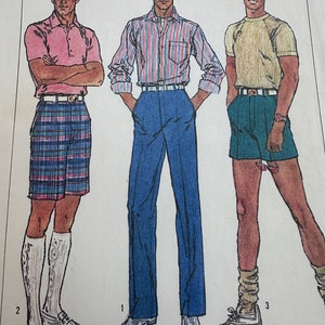 May include: Three men's fashion illustrations showing different outfit options. The first man is wearing a pink polo shirt, plaid shorts, and white knee-high socks. The second man is wearing a striped button-down shirt, blue pants, and white socks. The third man is wearing a yellow t-shirt, green shorts, and white socks.