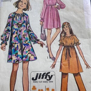 May include: A vintage sewing pattern for a maternity dress. The pattern is for size 8, bust 31 1/2 inches, waist 23 inches. The pattern is called "Jiffy" and is described as "easy cut - easy sew".