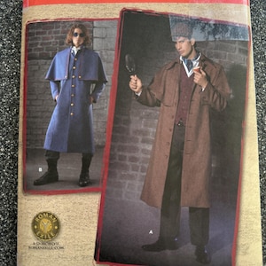 May include: A Simplicity sewing pattern envelope 2517, size BB 46, 48, 50, 52. The front displays two costume variations: a blue coat with a capelet and gold buttons, and a brown houndstooth coat with a matching hat, waistcoat, and dark trousers.