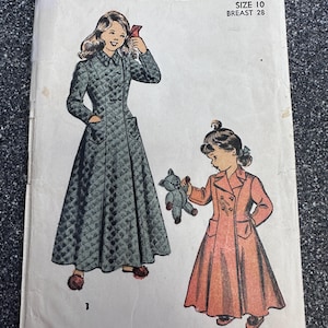 May include: A vintage Advance sewing pattern envelope, number 4992, size 10, breast 28. The illustration shows two long coats with double-breasted buttons and pockets. One coat is dark green with a quilted texture, and the other is a solid peach color.