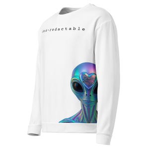 May include: White sweatshirt featuring a colorful alien graphic with the text "Power to the Collective" on its forehead. The words "jon-redactable" are printed in black on the upper left. The sweatshirt has long sleeves and a crew neck.