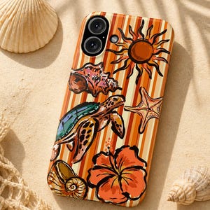 May include: A phone case with a beach theme, featuring a turtle, starfish, hibiscus flower, and seashells. The case has a striped orange and beige background. The case is surrounded by seashells on a sandy surface.