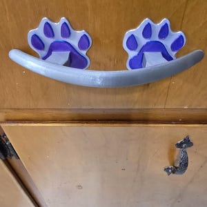 Tassavtryckshandtag – Djurlådhandtag