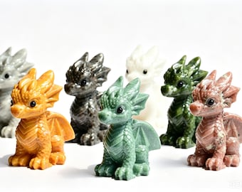 May include: A collection of seven small dragon figurines carved from various colored stones, including orange, dark gray, light green, white, dark green, and pink, each featuring detailed scales, wings, and black eyes.